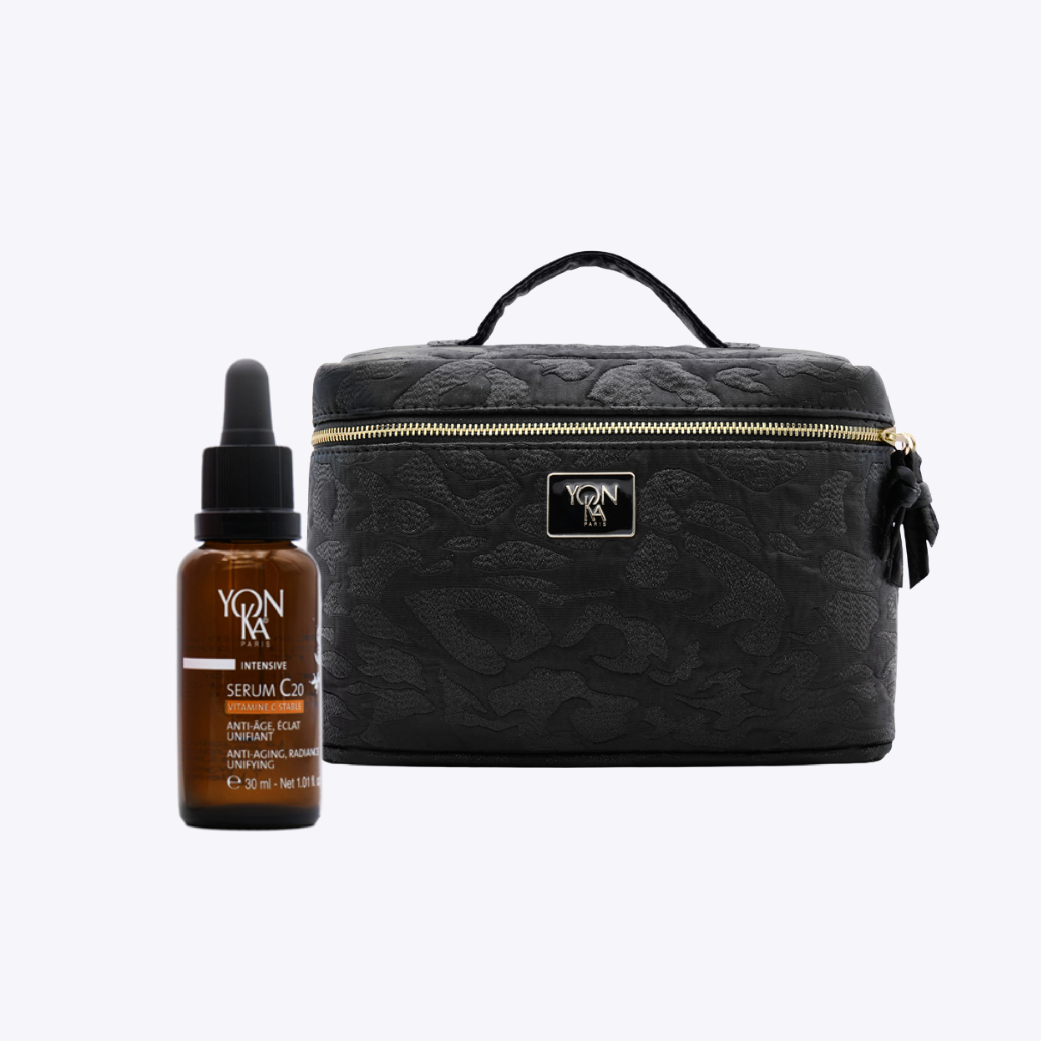 Serum C20 with a stunning black vanity bag