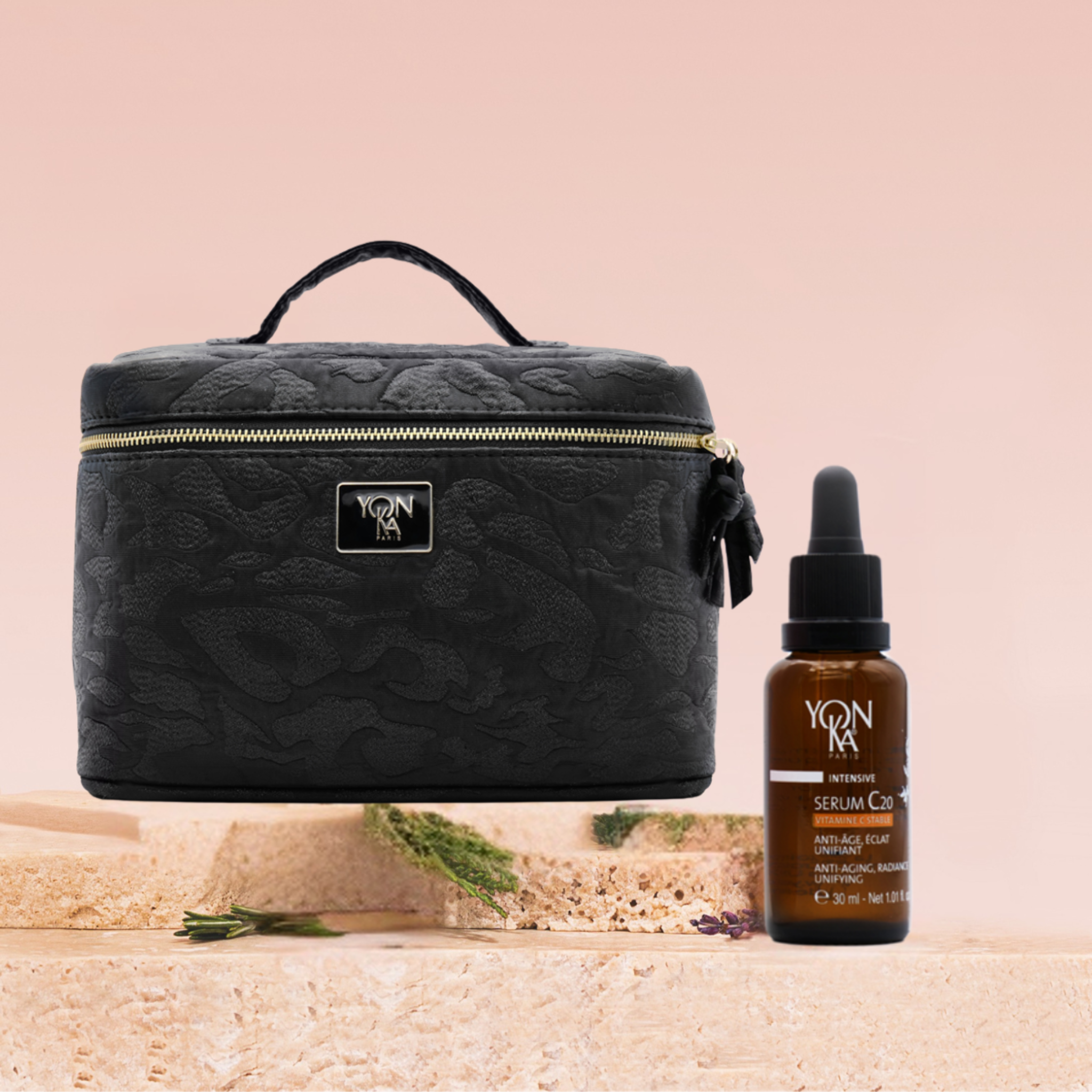 Serum C20 with a stunning black vanity bag